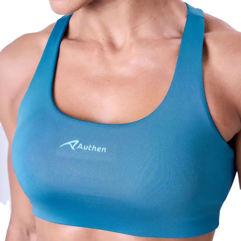 Vista traseira do top esportivo azul Authen com design de costas abertas